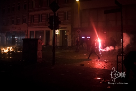 Flare is thrown at police